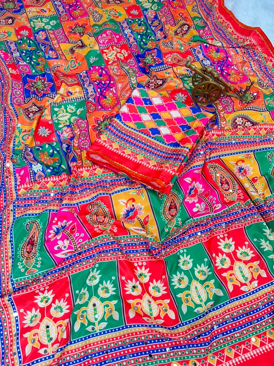 new launching ajarakh print with real mirror work and pallu fancy real diamond latkan attched and whole sarees piping