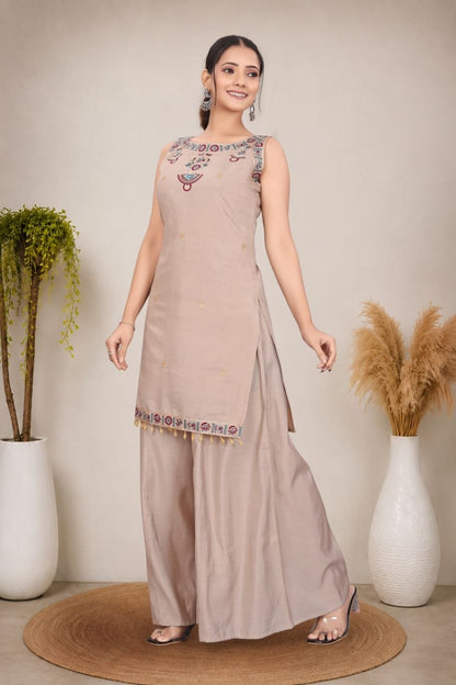 *Featuring beautiful Heavy Sleeveles Suit Set which is beautifully decorated Embroidered. It is paired with Plazzo.Complet Lining with Beautiful work*