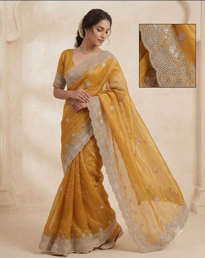 new launching mat sequence work with gold zari thread embroidered work and whole sarees have multi thread butta work and Arco border work