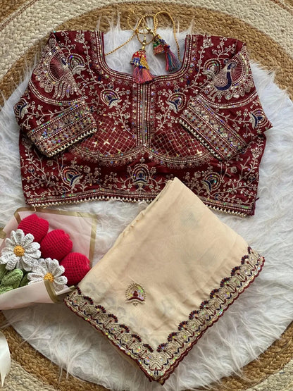 new launching ajarakh print with real mirror work and pallu fancy real diamond latkan attched and whole sarees piping   *Blouse :Running fabric with printed and mirror attched  Length:-5.50 MTR sarees and 0.90mtr