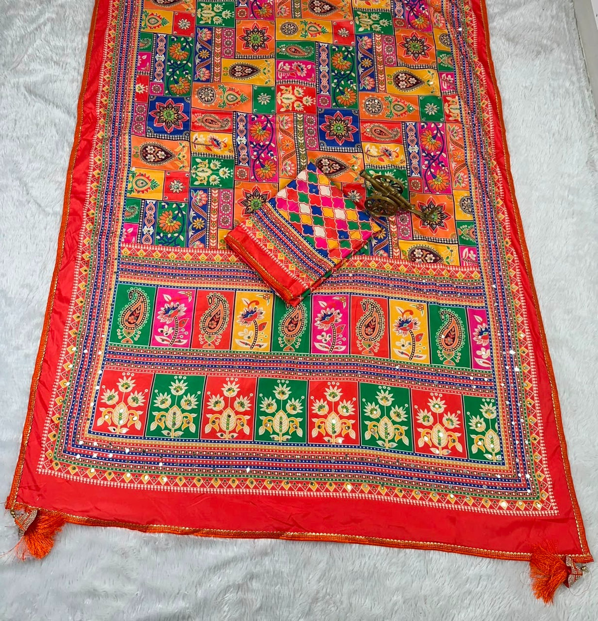 new launching ajarakh print with real mirror work and pallu fancy real diamond latkan attched and whole sarees piping